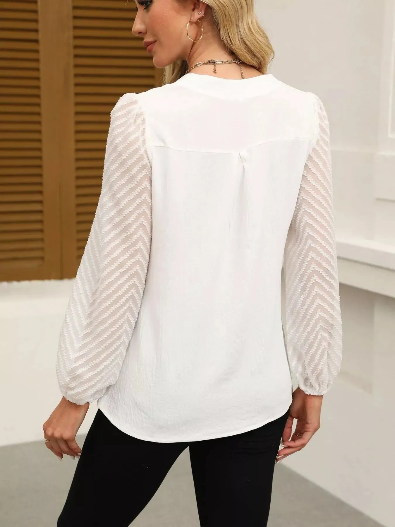 Notched Balloon Sleeve Blouse sold by Charming Charlie product image thumbnail 3