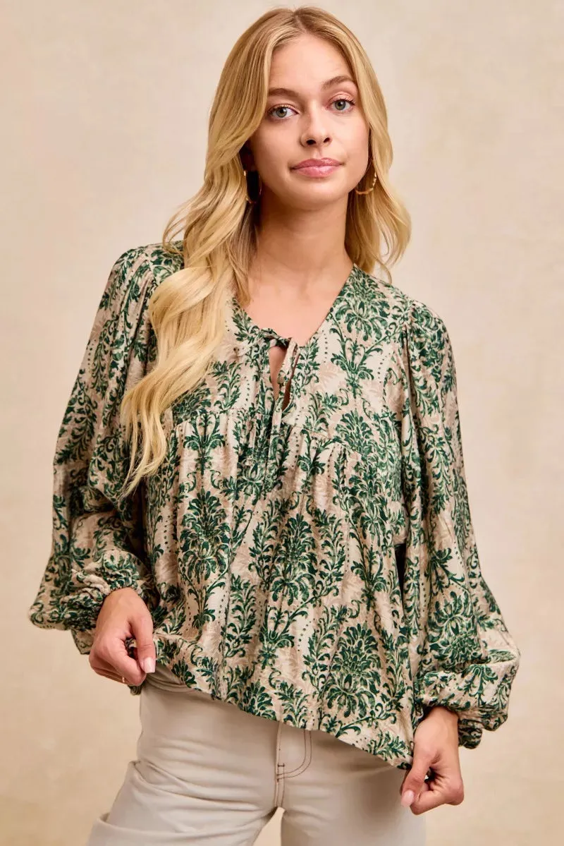 BiBi Printed Woven Front Tied Blouse with Baloon Sleeve sold by Charming Charlie