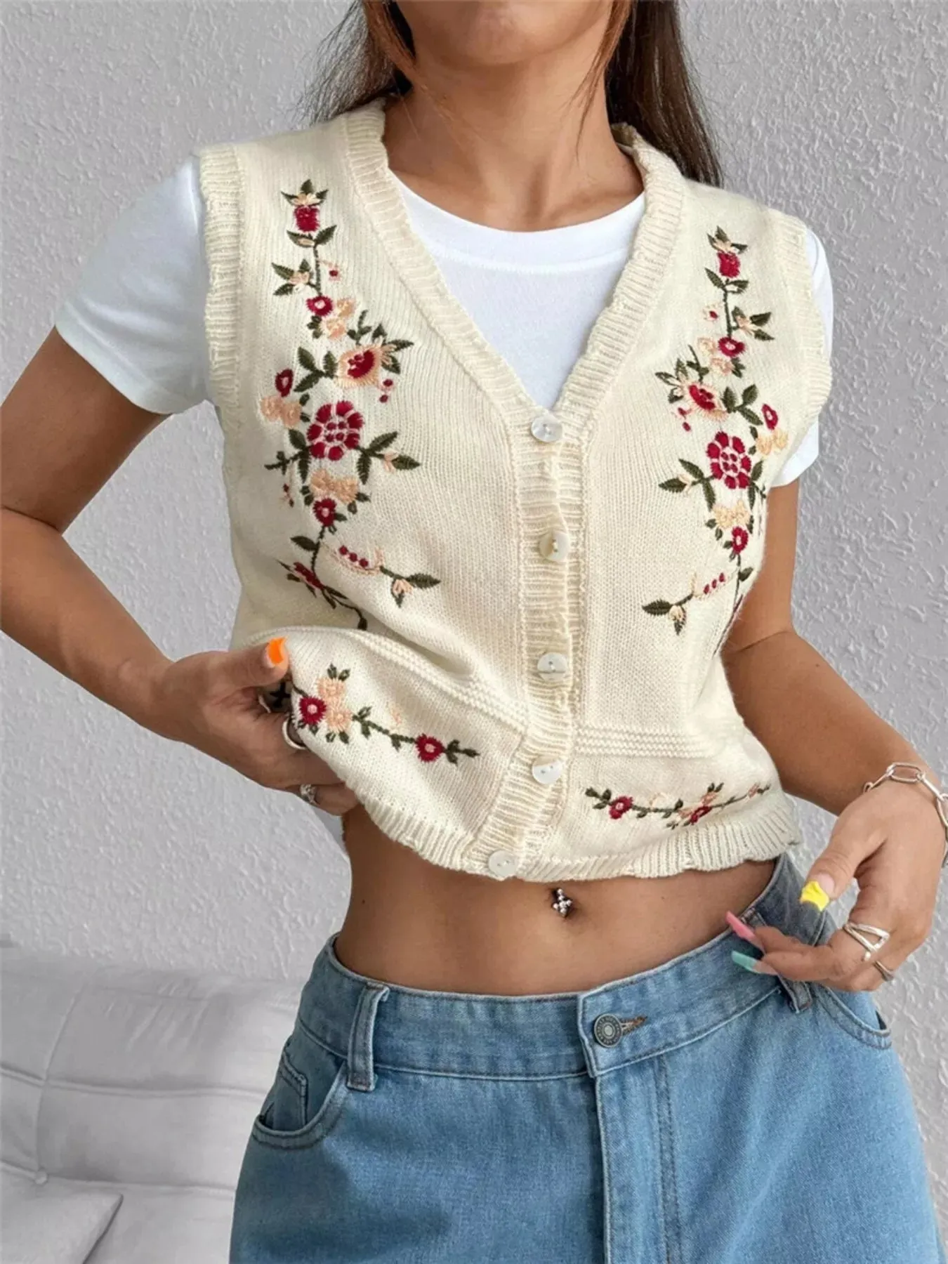 Embroidered Button Up Sweater Vest sold by Charming Charlie
