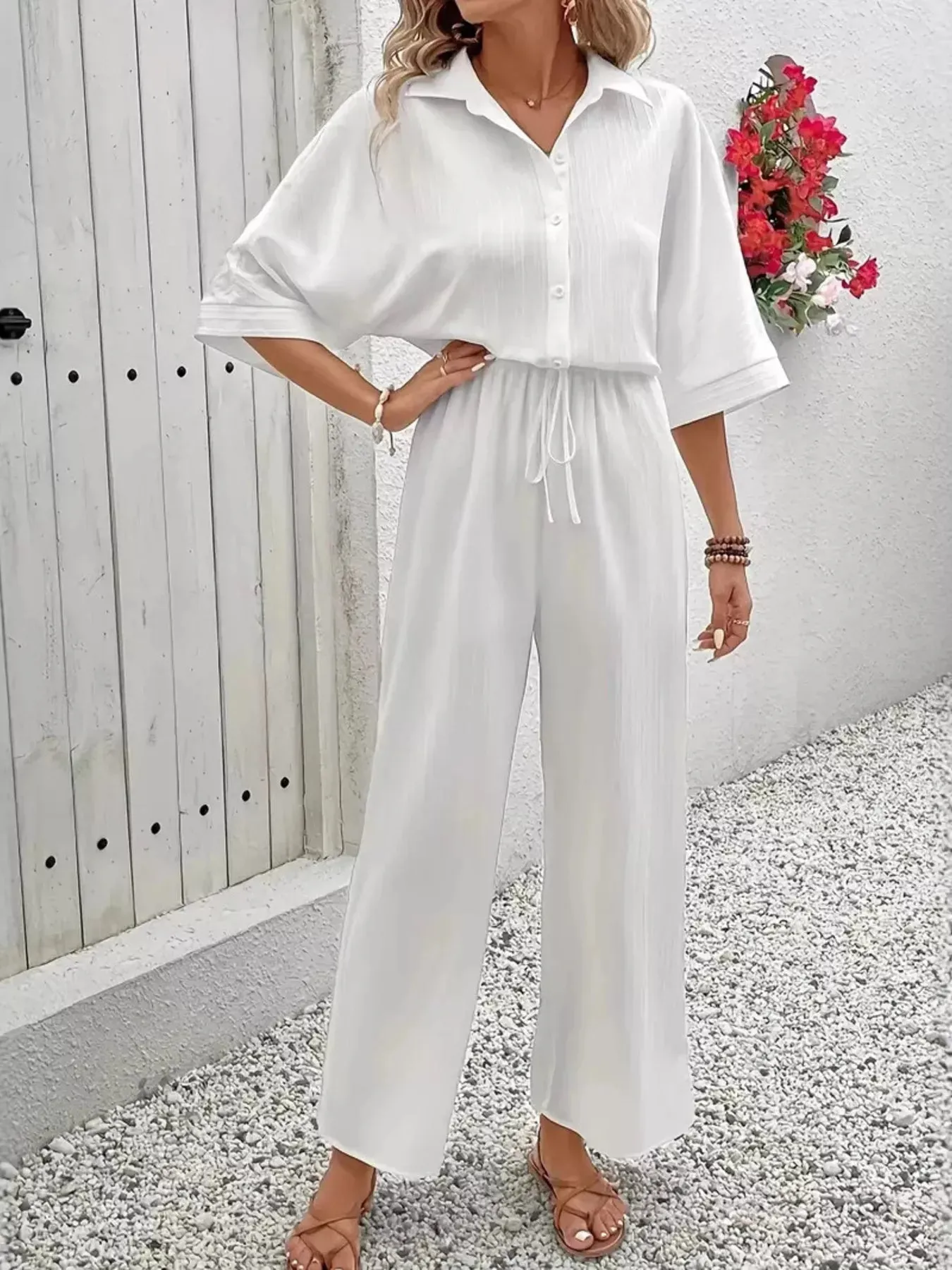 Button Front Half Sleeve Wide Leg Jumpsuit sold by Charming Charlie product image thumbnail 4