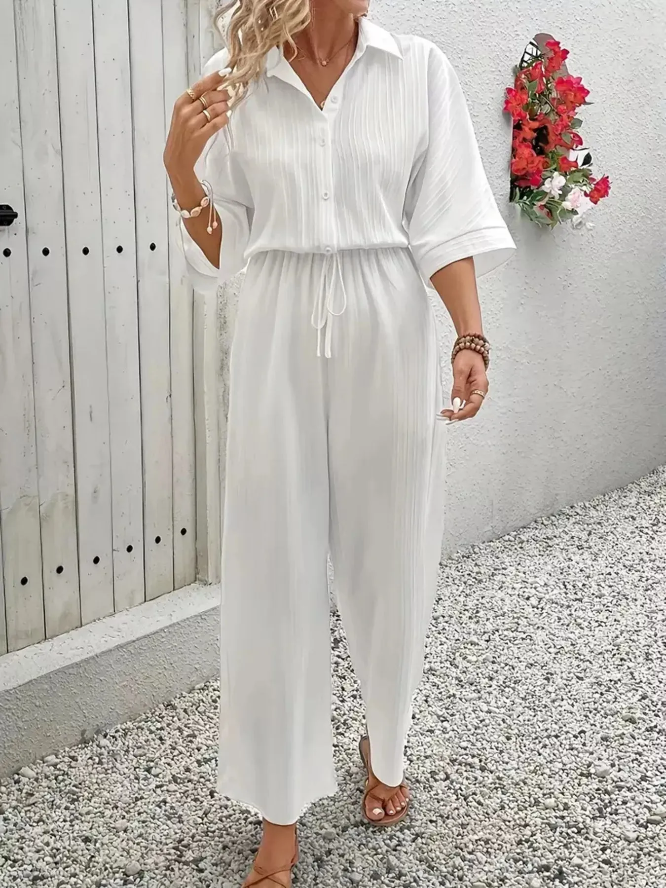 Button Front Half Sleeve Wide Leg Jumpsuit sold by Charming Charlie product image thumbnail 2