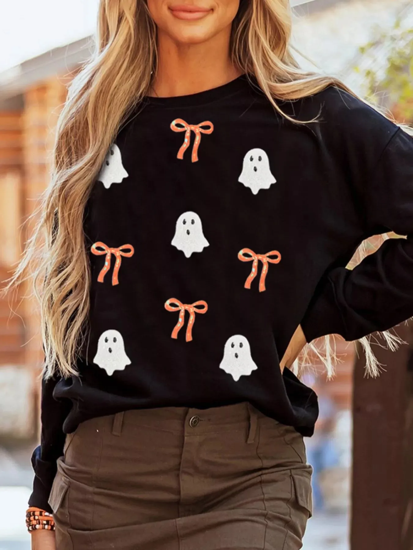 Halloween Ghost Bow Sequin Patched Drop Shoulder Sweatshirt sold by Charming Charlie
