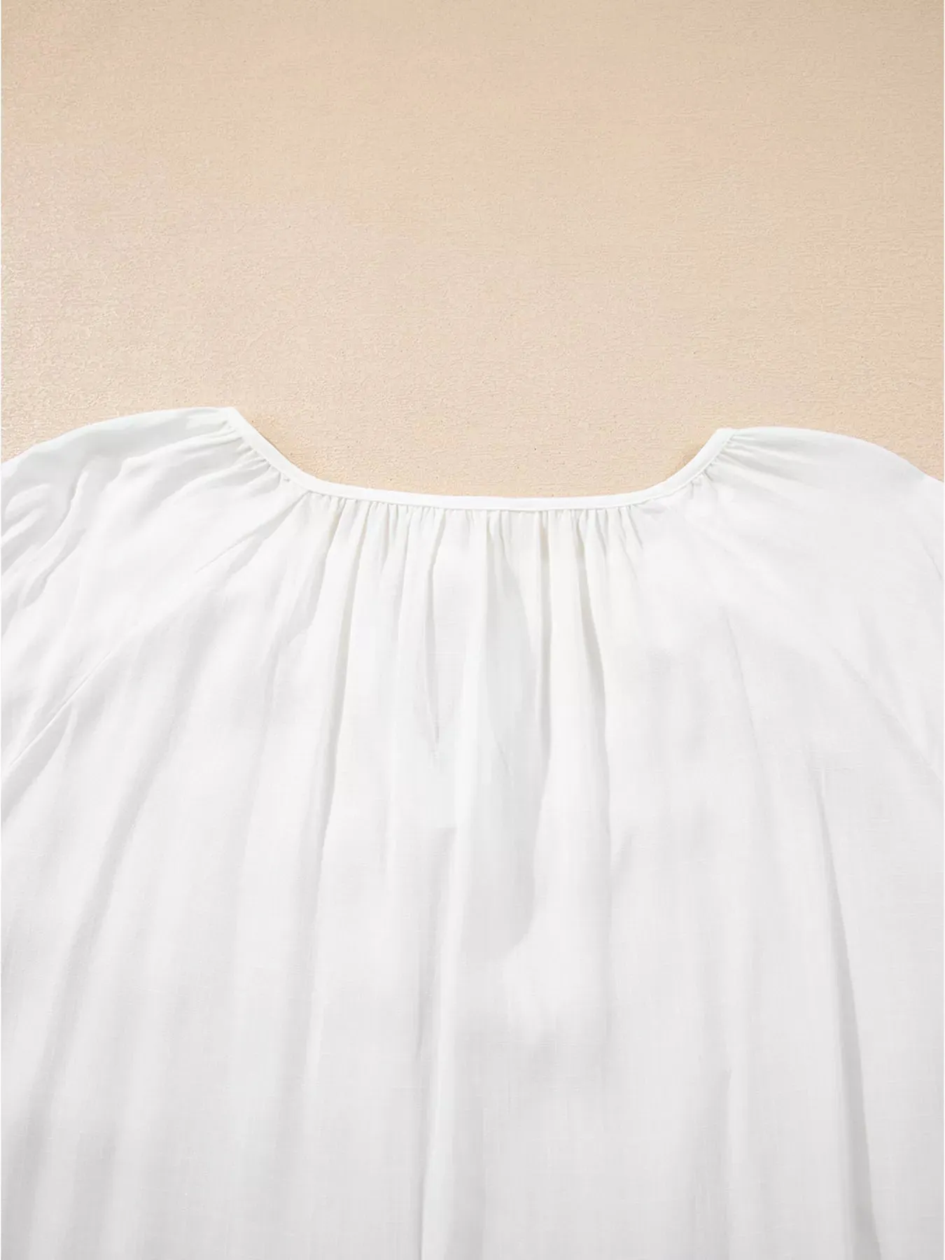 Floral Embroidered Tie Neck Blouse sold by Charming Charlie product image thumbnail 5