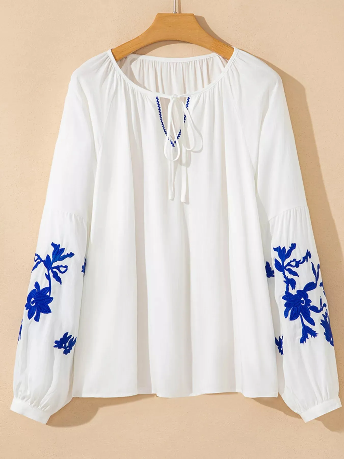 Floral Embroidered Tie Neck Blouse sold by Charming Charlie product image thumbnail 2