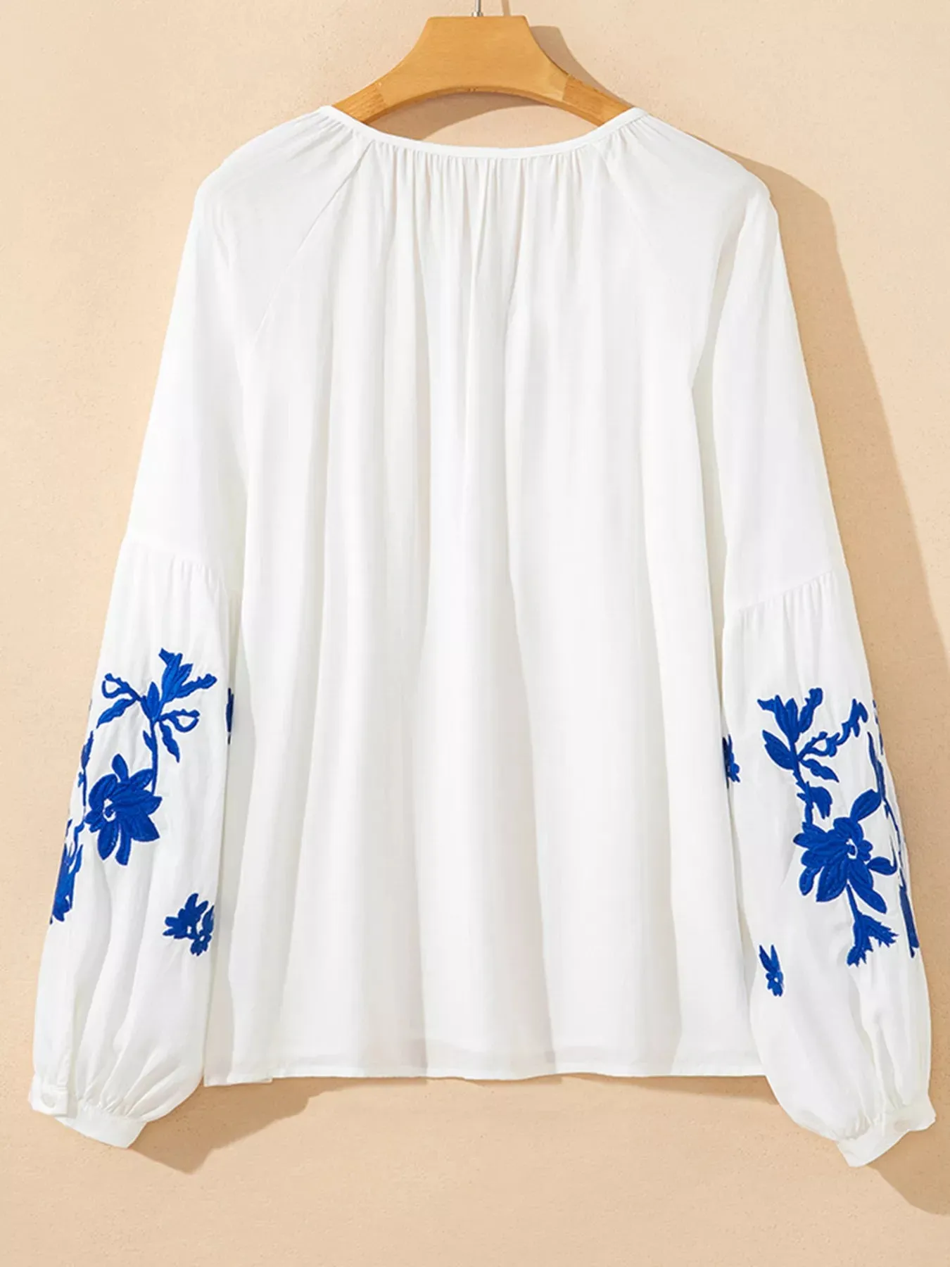 Floral Embroidered Tie Neck Blouse sold by Charming Charlie product image thumbnail 3