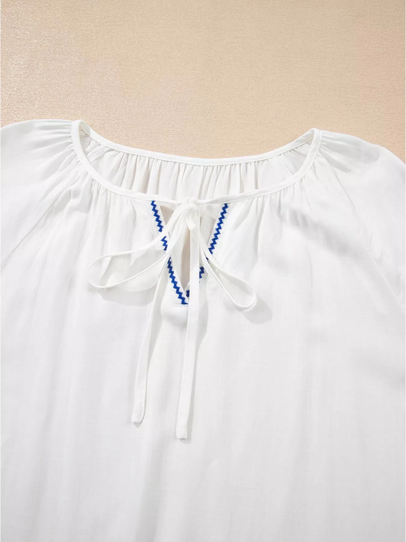 Floral Embroidered Tie Neck Blouse sold by Charming Charlie product image thumbnail 4