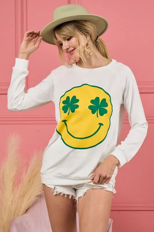 BiBi Smile Face Graphic Round Neck Long Sleeve Top sold by Charming Charlie
