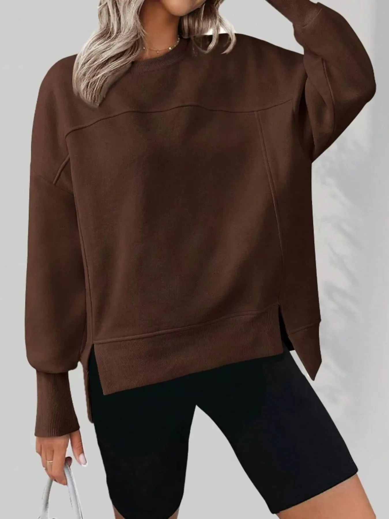 Slit Round Neck Dropped Shoulder Sweatshirt sold by Charming Charlie