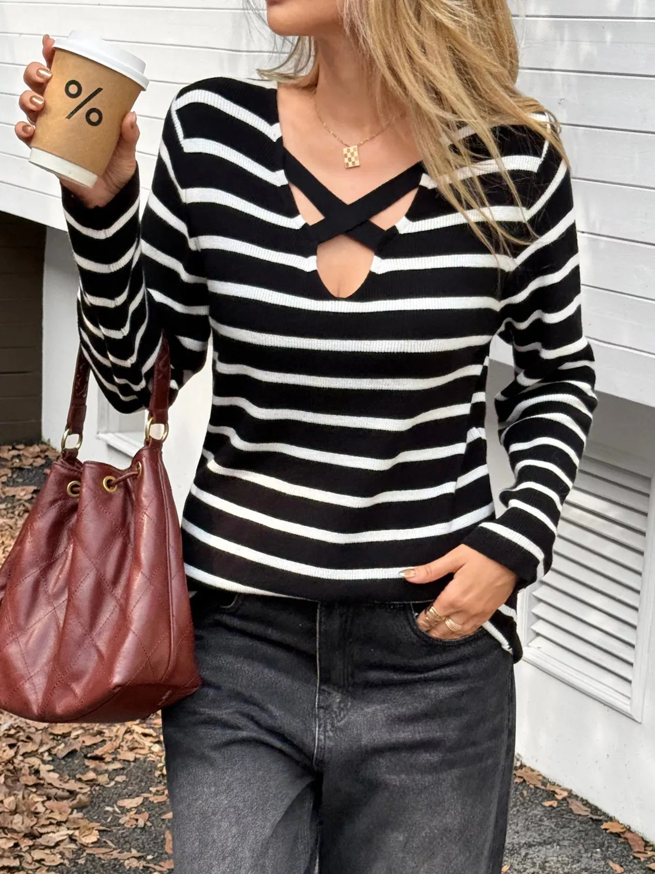 Striped Cross Front Long Sleeve Knit Top sold by Charming Charlie