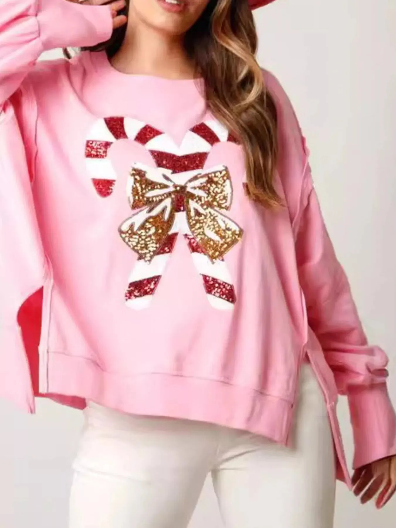 Christmas Candy Cane Bow Dropped Shoulder Sweatshirt sold by Charming Charlie product image thumbnail 2