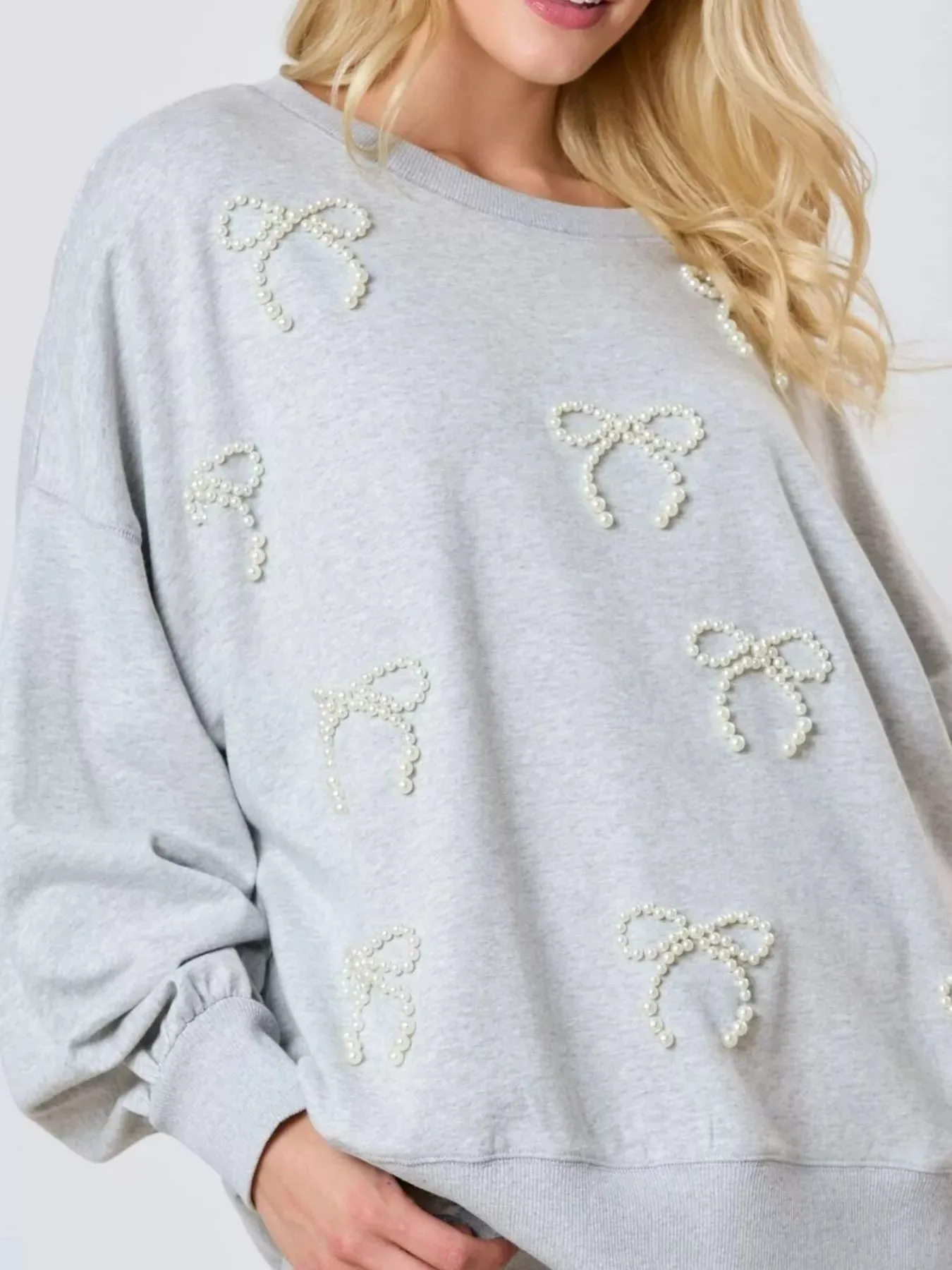 Pearl Embellished Bow Long Sleeve Sweatshirt sold by Charming Charlie product image thumbnail 3