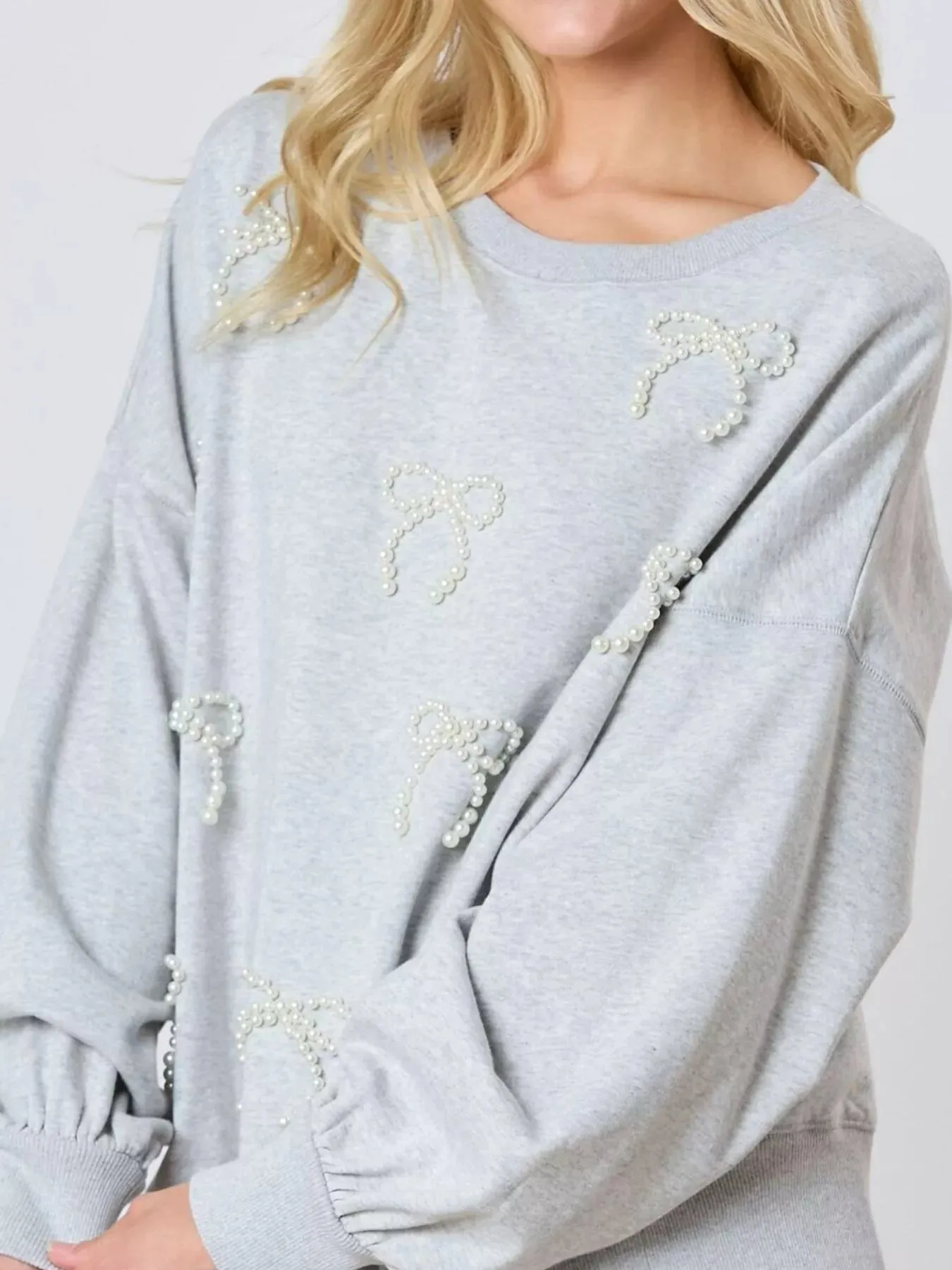 Pearl Embellished Bow Long Sleeve Sweatshirt sold by Charming Charlie product image thumbnail 4