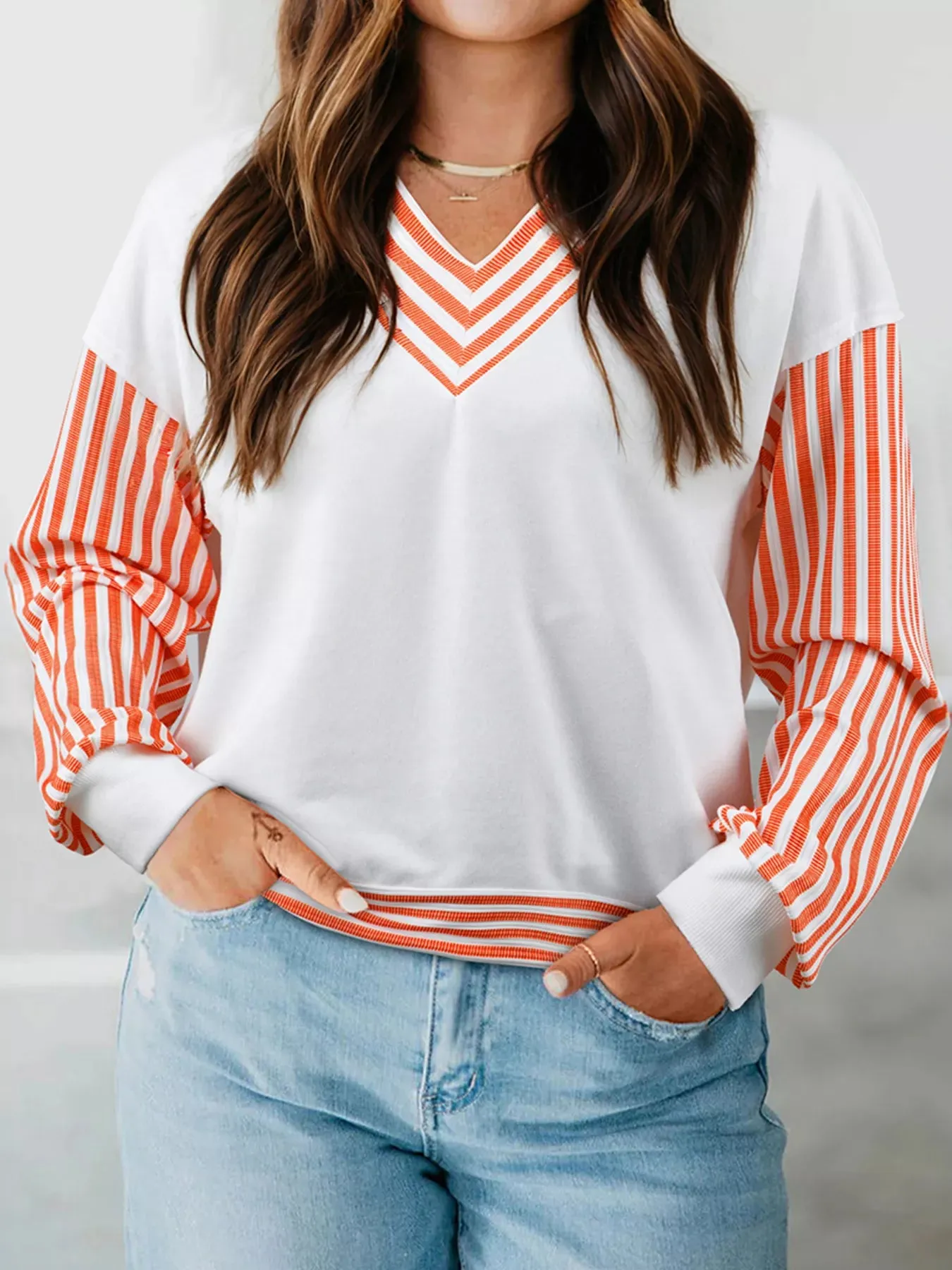 Stripe V Neck Drop Shoulder Patchwork Long Sleeve Top sold by Charming Charlie