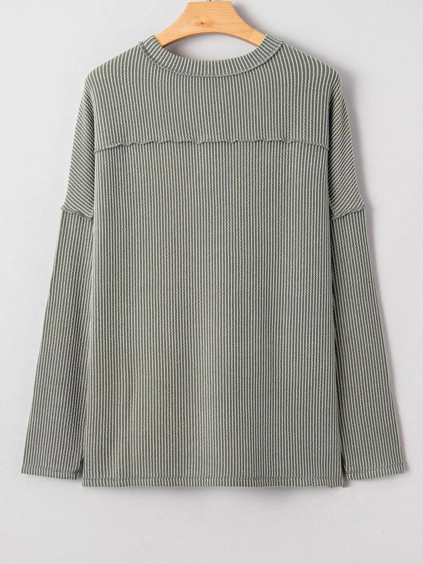 Twist Ribbed Exposed Seam Detail Long Sleeve Loose Top sold by Charming Charlie product image thumbnail 4