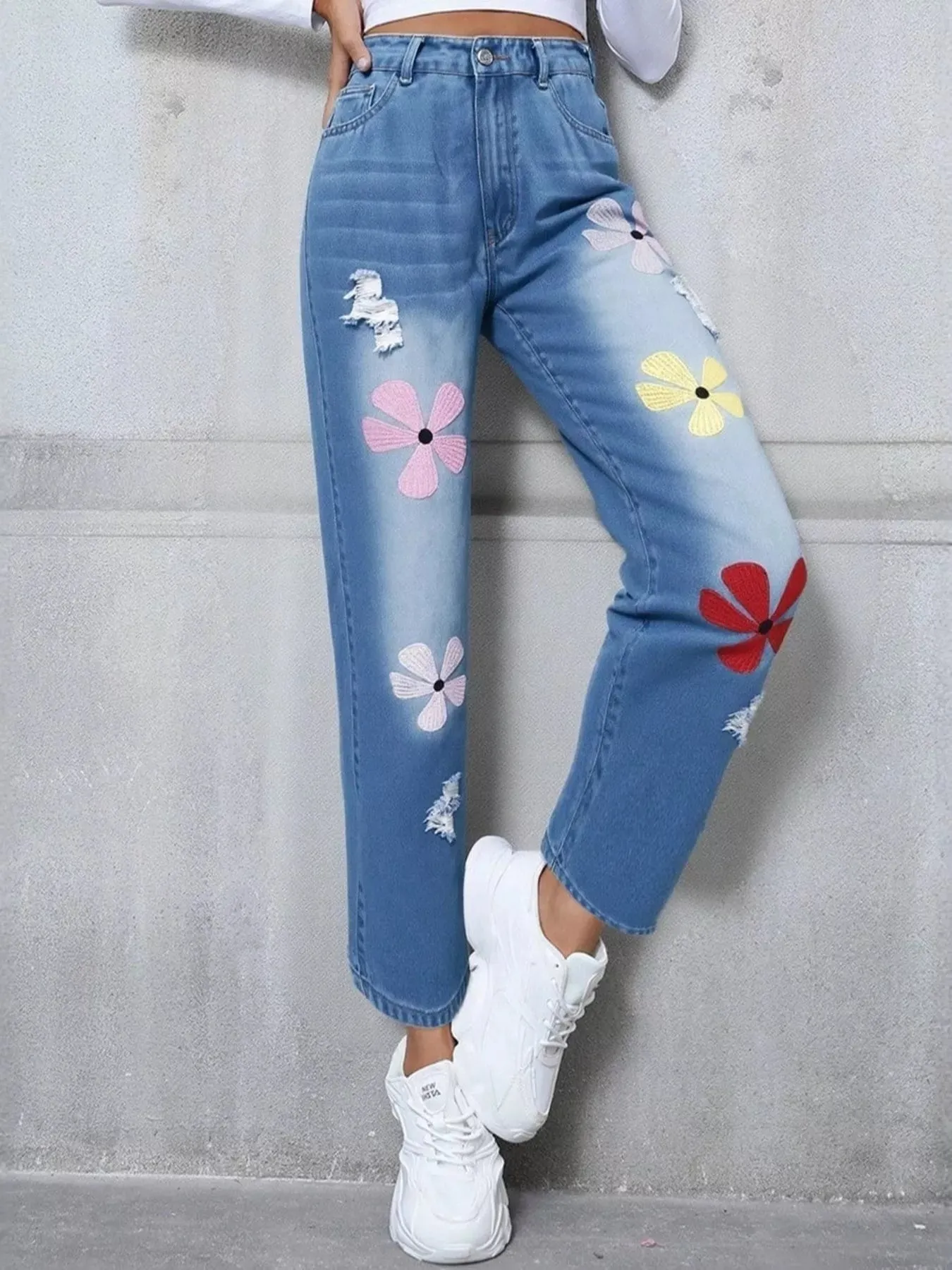 Floral Embroidered High Waist Distressed Jeans sold by Charming Charlie