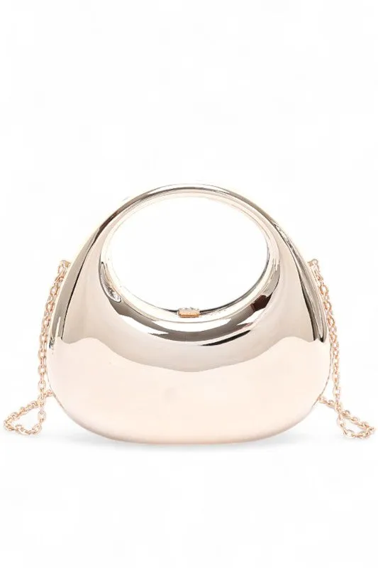 Polished Molded Top Handle Clutch sold by Charming Charlie