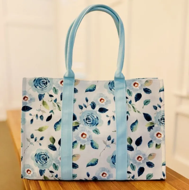 Bloom Blue Floral Couture Tote sold by Charming Charlie
