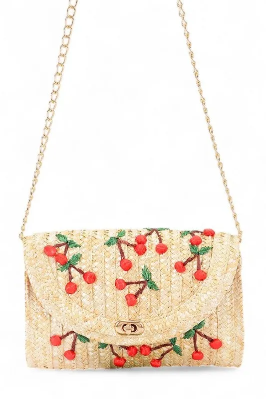Embroidery Cherry Raffia Straw Clutch Bag sold by Charming Charlie