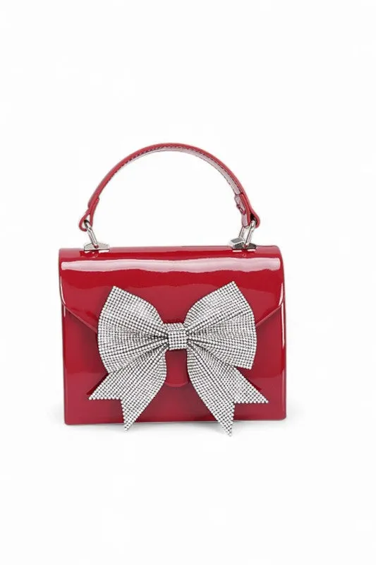 Rhinestone Bow Tie Patent Finish Crossbody Bag sold by Charming Charlie product image thumbnail 3
