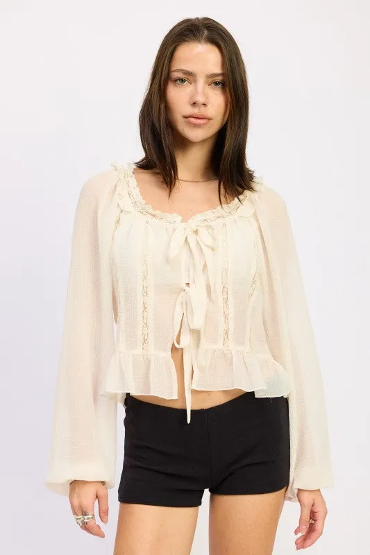 ROUND NECK LONGSLEEVE FLARED BLOUSE sold by Charming Charlie