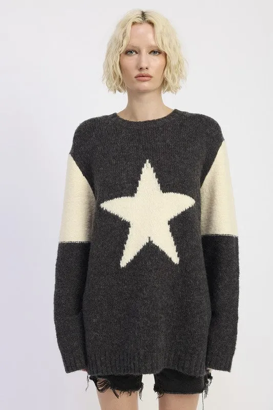 OVERSIZED SWEATER WITH STAR PRINT sold by Charming Charlie