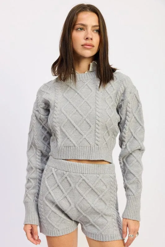 CABLE KNIT CROPPED SWEATER sold by Charming Charlie
