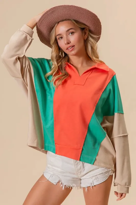 BiBi Colorblock Exposed Seam French Terry Sweatshirt sold by Charming Charlie