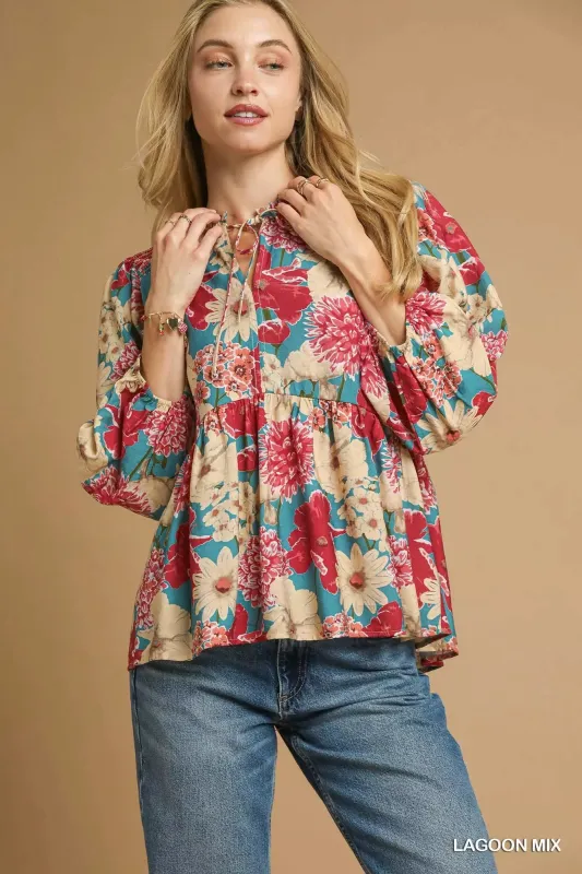 Umgee Mix Floral Peplum Blouse with Tie Neck sold by Charming Charlie