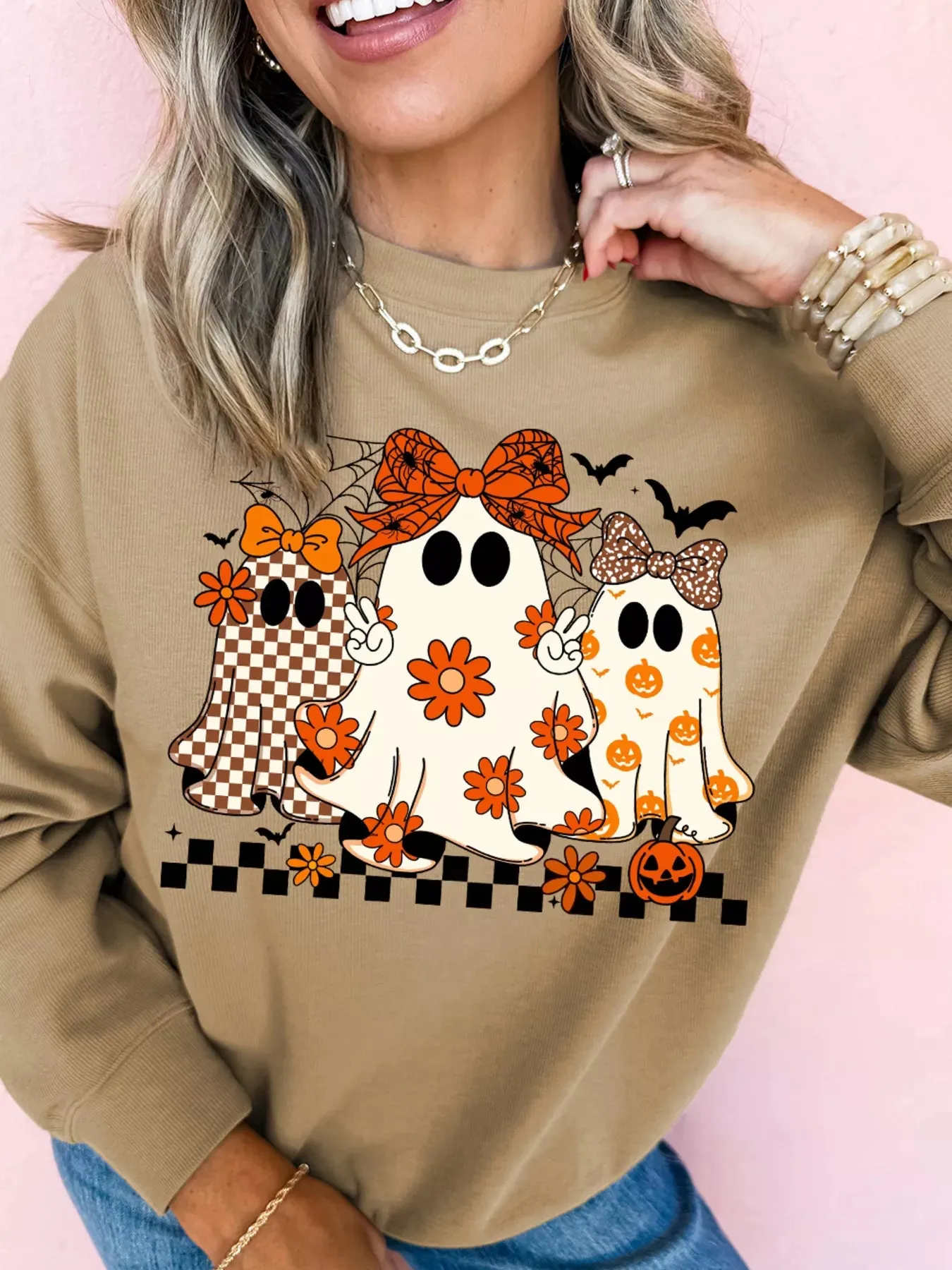 Halloween Ghost Graphic Drop Shoulder Sweatshirt sold by Charming Charlie