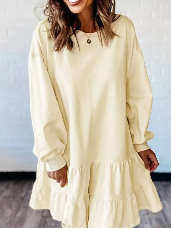 Double Tiered Ruffle Hem Long Sleeve Loose Mini Dress sold by Charming Charlie