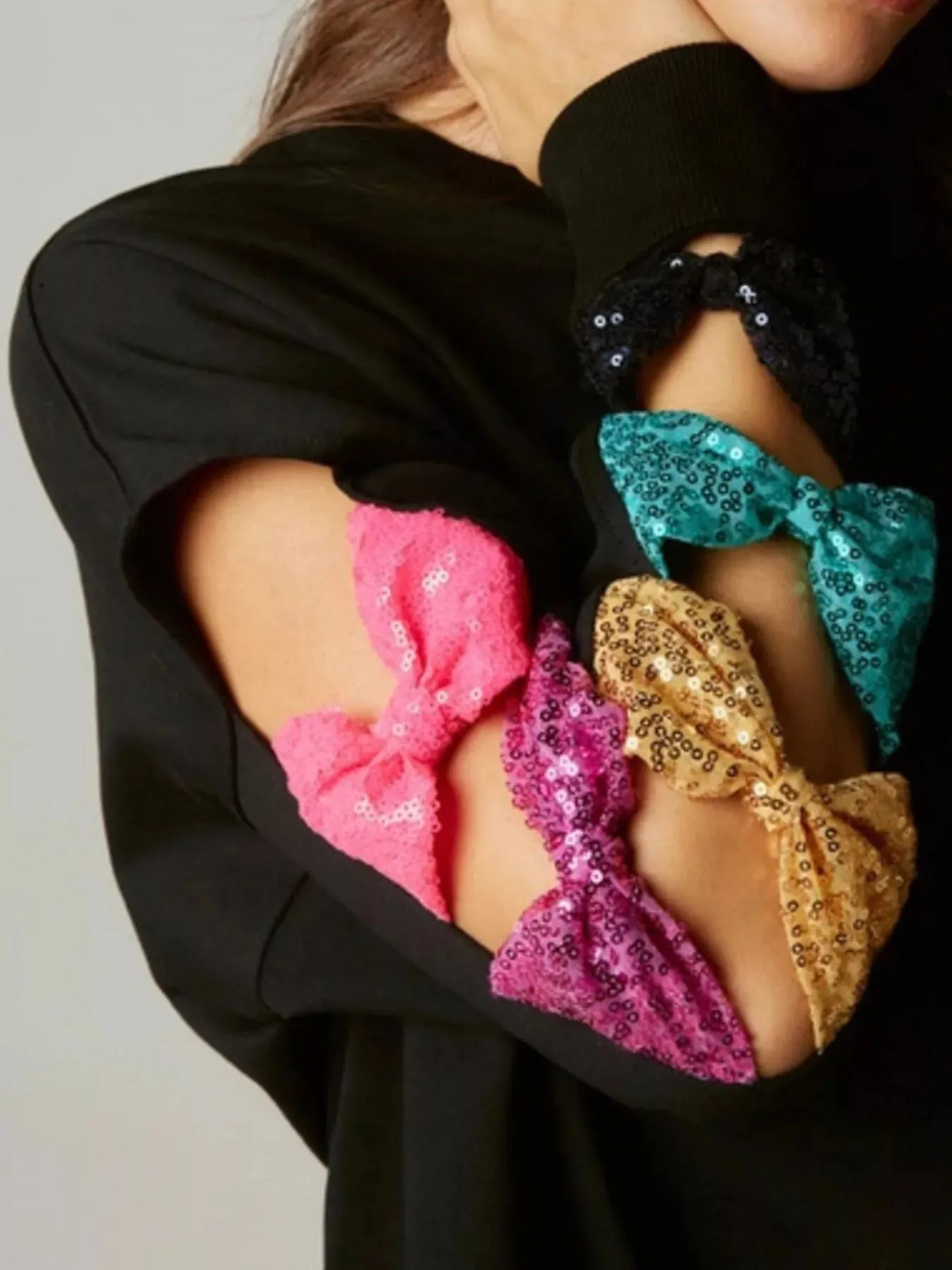 Sequin Bow Cutout Round Neck Sweatshirt sold by Charming Charlie product image thumbnail 4