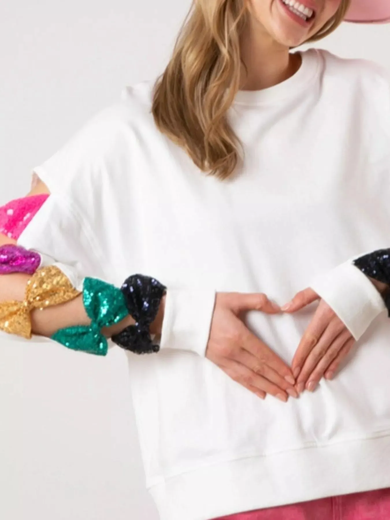 Sequin Bow Cutout Round Neck Sweatshirt sold by Charming Charlie product image thumbnail 5