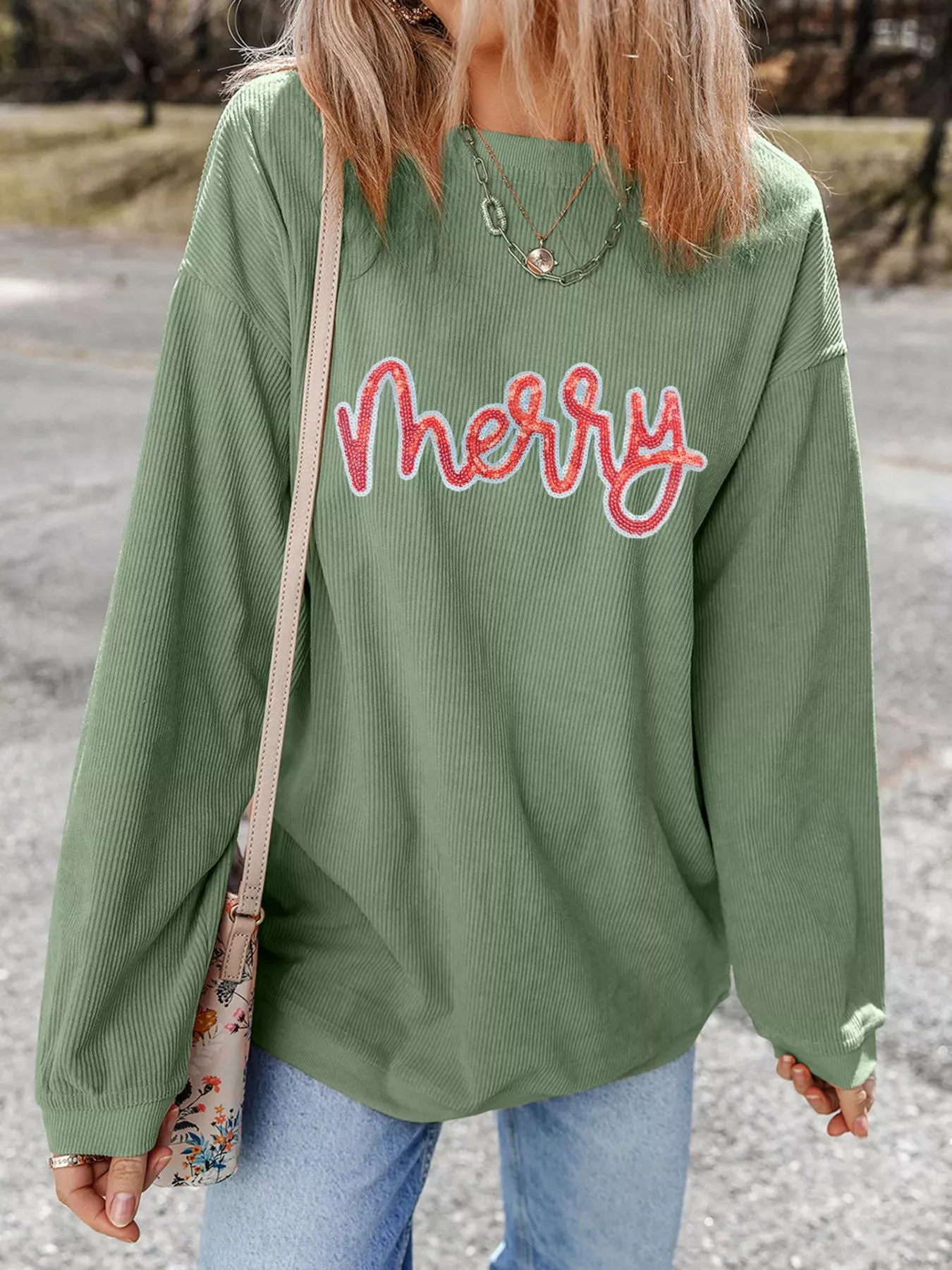 Merry Letter Christmas Sequined Twisted Ribbed Sweatshirt sold by Charming Charlie