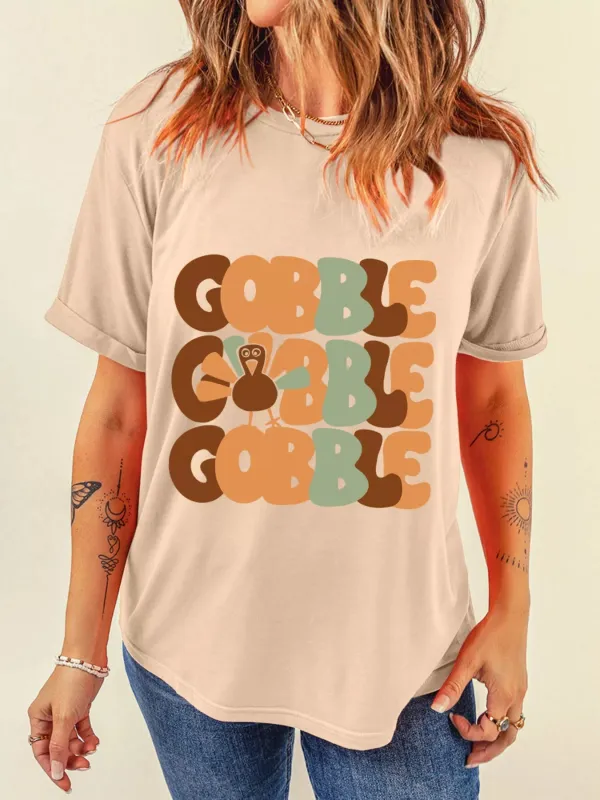 GOBBLE Turkey Graphic Thanksgiving Round Neck Tee sold by Charming Charlie