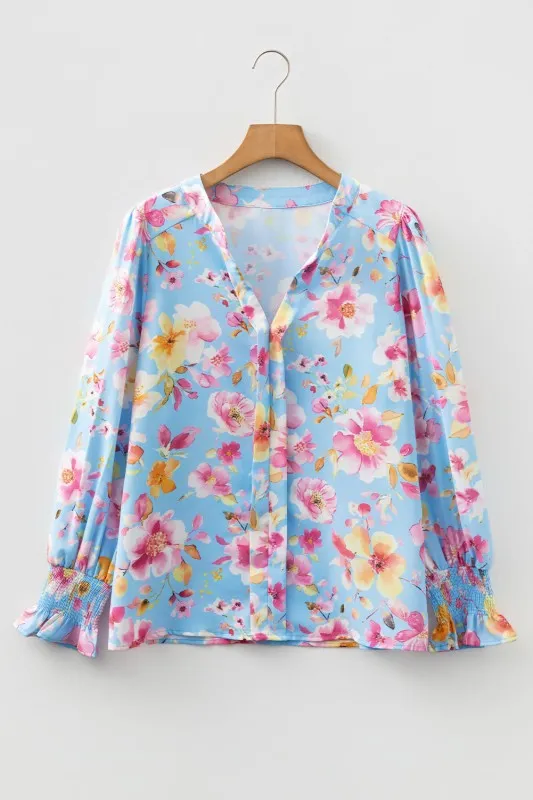 Floral Smocked Long Sleeve V-Neck Blouse sold by Charming Charlie