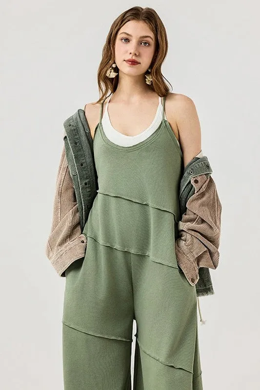 Keyhole back Wide Leg Raw Edge Jumpsuit sold by Charming Charlie