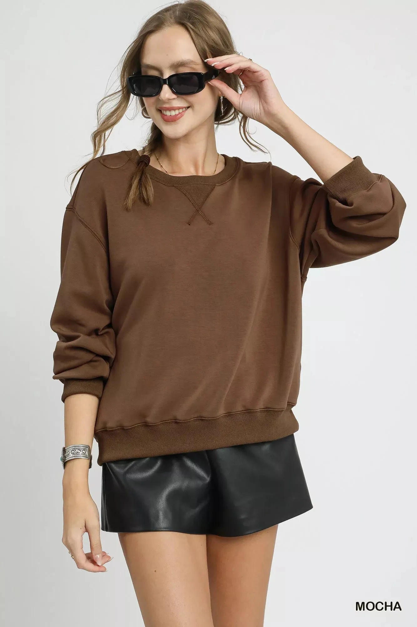 Umgee Round Neck Long Sleeve Fleece Sweatshirt sold by Charming Charlie