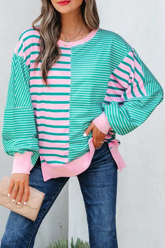 Stripe Colorblock Patchwork Side Slit Sweatshirt sold by Charming Charlie