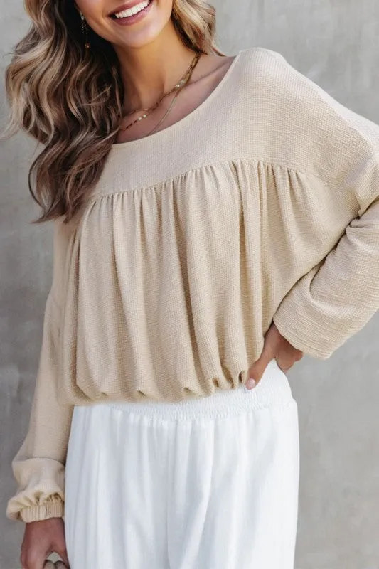 Solid Ribbed Knit Pleated Long Sleeve Top sold by Charming Charlie
