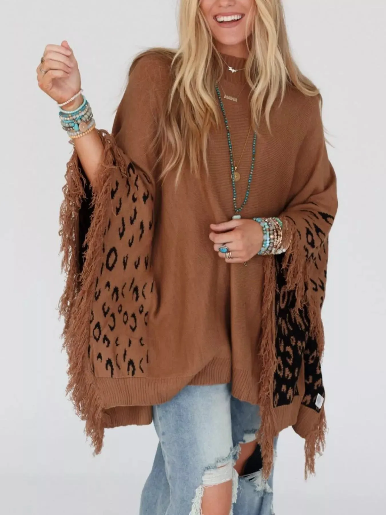 Fringe Leopard Mock Neck Batwing Sleeve Knit Top sold by Charming Charlie