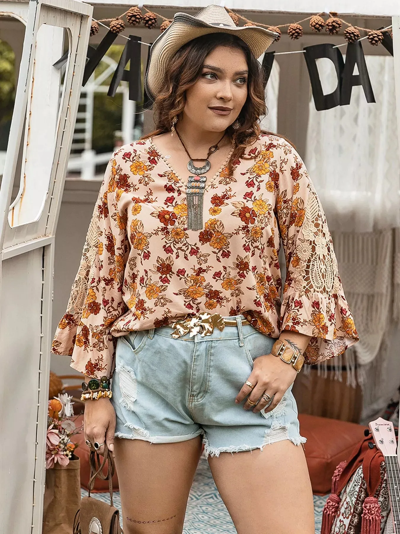 Plus Size Floral Lace Detail V-Neck Blouse sold by Charming Charlie
