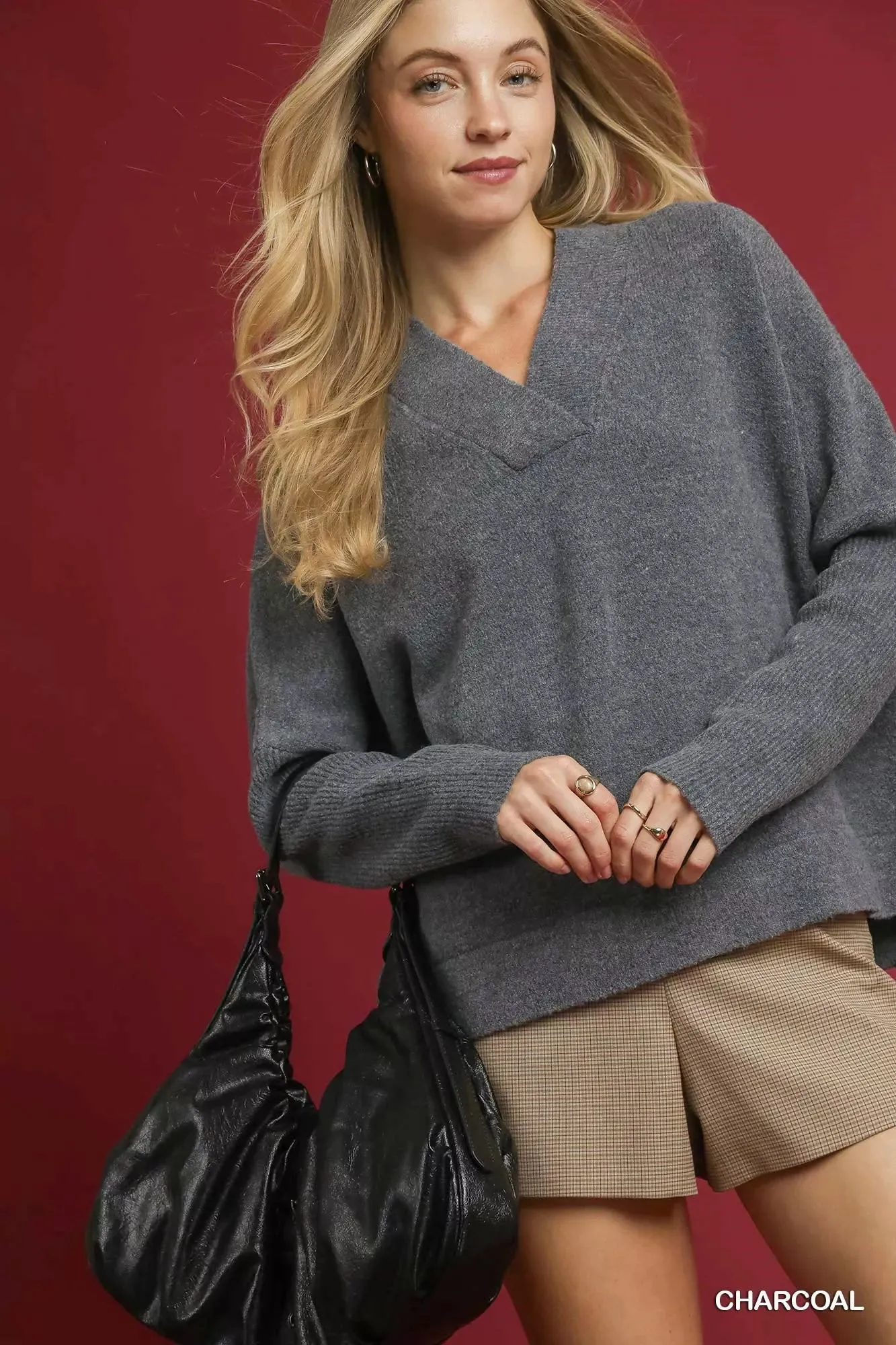 Umgee V-Neck Sweater with Wide Trim Detail sold by Charming Charlie