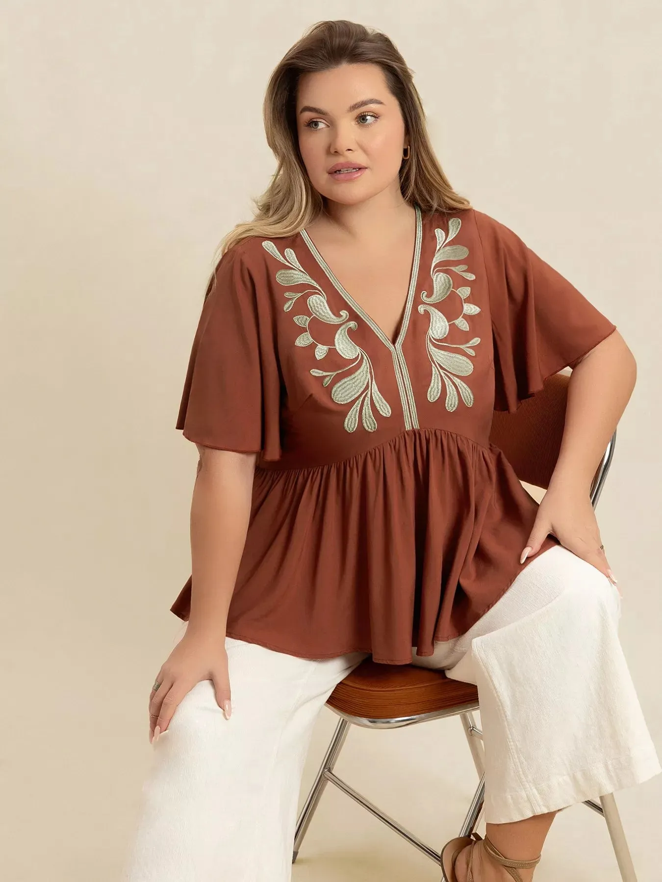 Plus Size Embroidered V-Neck Flutter Sleeve Blouse sold by Charming Charlie product image thumbnail 2