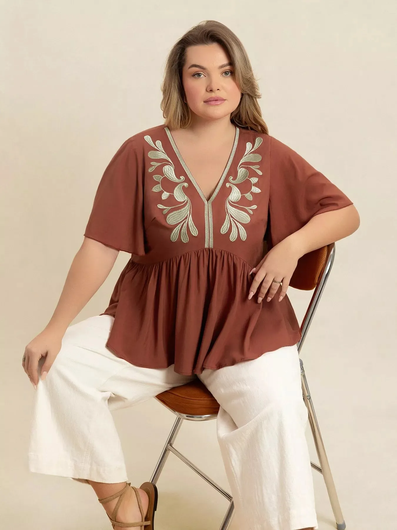 Plus Size Embroidered V-Neck Flutter Sleeve Blouse sold by Charming Charlie product image thumbnail 4