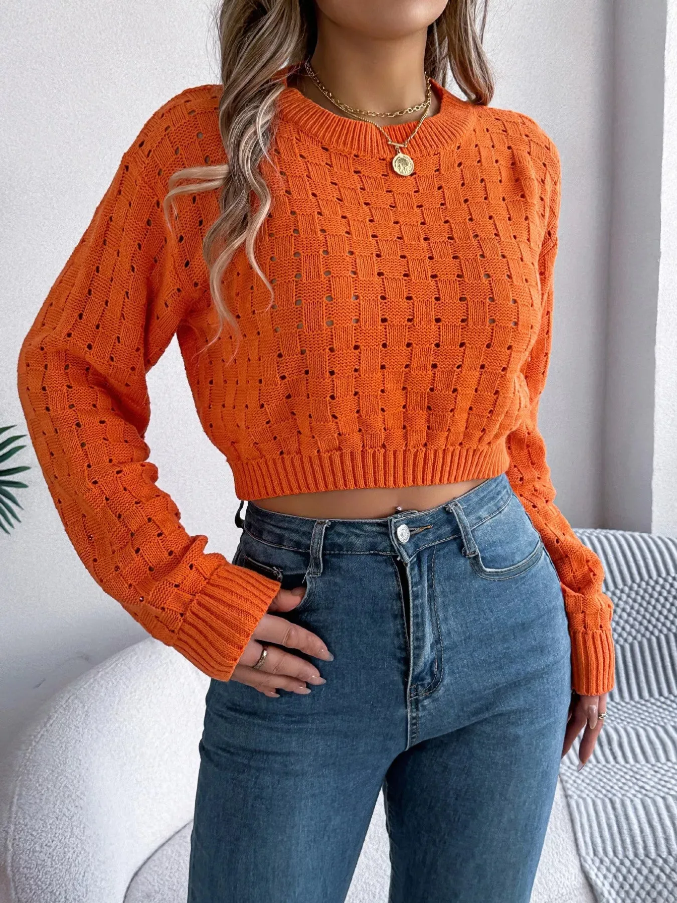 Cutout Back Openwork Round Neck Long Sleeve Sweater sold by Charming Charlie