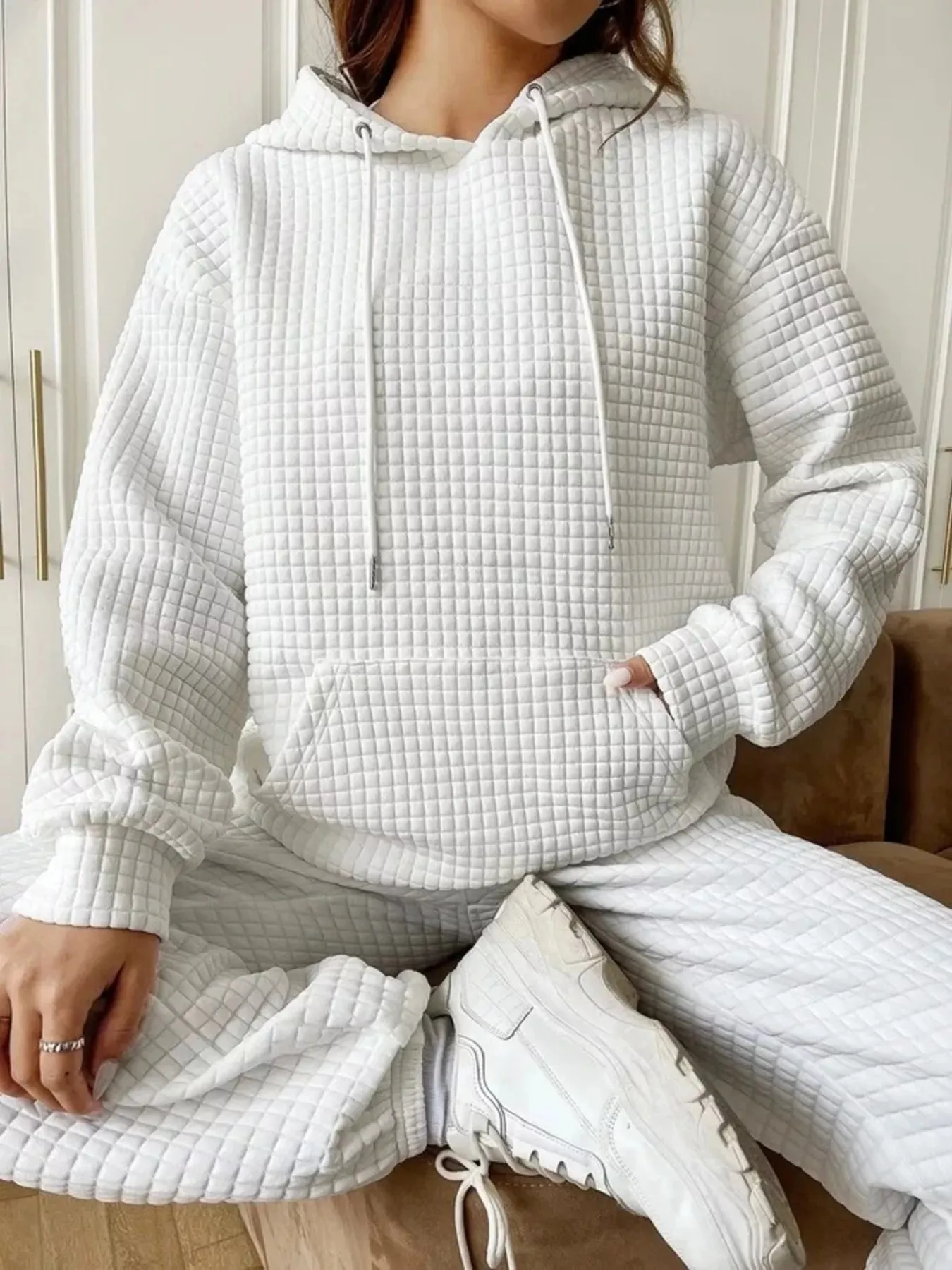 Waffle Knit Hoodie with Drawstring Details sold by Charming Charlie