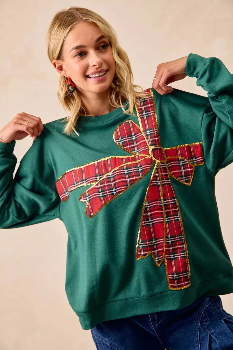 BiBi Plaid Ribbon Bow Detail Christmas Fleece Pullover sold by Charming Charlie product image thumbnail 3