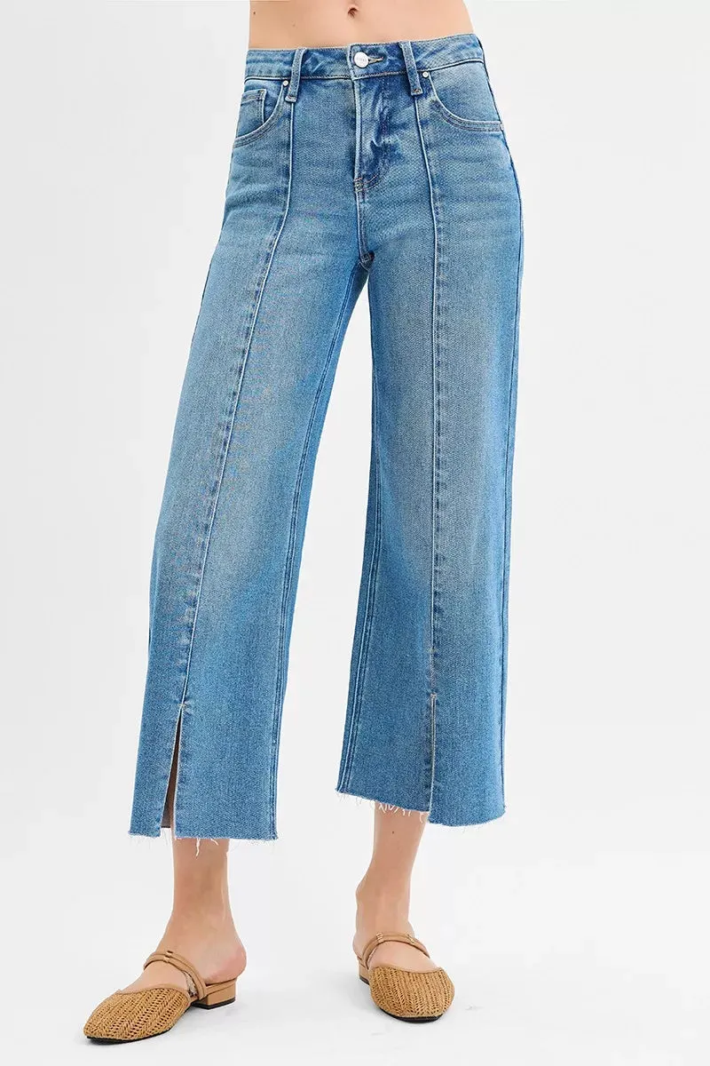 RISEN Tummy Control Mid Rise Crop Wide Front Slit Jeans sold by Charming Charlie