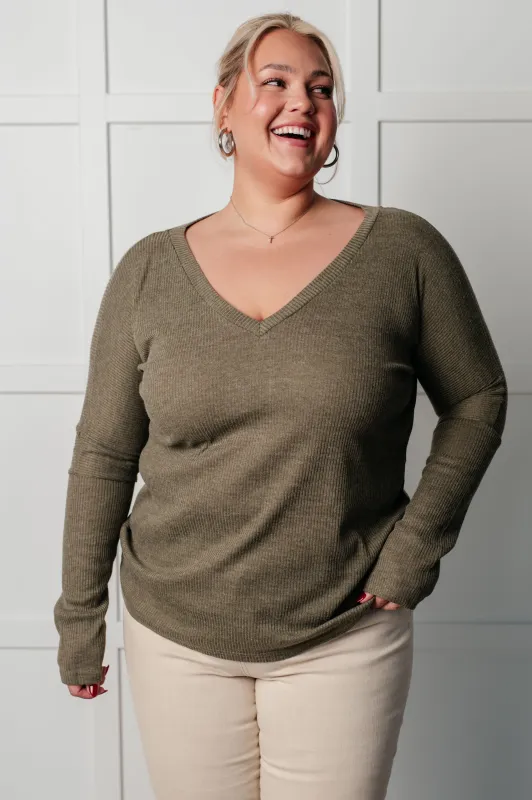 On a Roll Ribbed Knit V Neck Long Sleeve Top sold by Charming Charlie