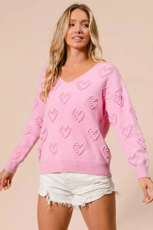 BiBi Valentines Heart Pompom V Neck Knit Top sold by Charming Charlie